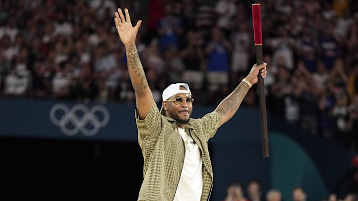Aug 6, 2024; Paris, France; Carmelo Anthony performs before a men’s basketball quarterfinal game between the United States and Brazil during the Paris 2024 Olympic Summer Games at Accor Arena. Mandatory Credit: Kyle Terada-Imagn Images