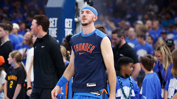 Oklahoma City Thunder guard Alex Caruso warms up before the start of game seven of the second round for the 2025 NBA Playoffs. 