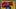 Image of Brady with 12 blue NE Patriots Jersey over top of gold background with red "Kaboom!" Image of Brady with 12 blue NE Patriots Jersey over top of gold background with red "Kaboom!"