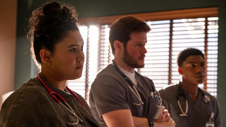 BRILLIANT MINDS -- "The Doctor Whose World Collapsed" Episode 112 -- Pictured: (l-r) Aury Krebs as Dr. Dana Dang, Alex MacNicoll as Dr. Van Markus, Spence Moore II as Dr. Jacob Nash