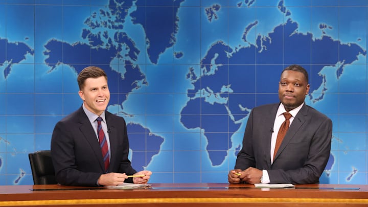 SATURDAY NIGHT LIVE -- Episode 1864 -- Pictured: (l-r) Anchor Colin Jost and anchor Michael Che during Weekend Update on Saturday, May 18, 2024 -- (Photo by: Will Heath/NBC)