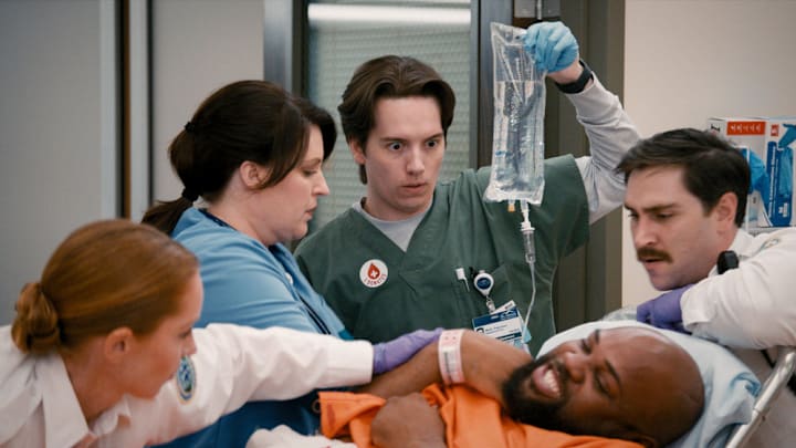ST. DENIS MEDICAL -- "50 CC's of Kindness" Episode 107 -- Pictured: (l-r) Allison Tolman as Alex, Mekki Leeper as Matt -- (Photo by: NBC) ST. DENIS MEDICAL -- "50 CC's of Kindness" Episode 107 -- Pictured: (l-r) Allison Tolman as Alex, Mekki Leeper as Matt -- (Photo by: NBC)