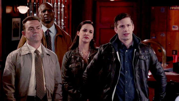 BROOKLYN NINE-NINE -- "Blue Flu" Episode 803 -- Pictured in this screen grab: (l-r) Joe Lo Truglio as Charles Boyle, Melissa Fumero as Amy Santiago, Andy Samberg as Jake Peralta -- (Photo by: NBC)
