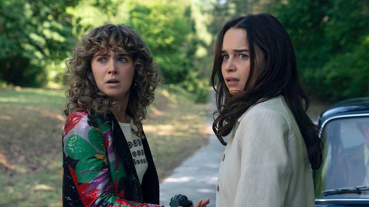 PONIES -- Someone Saved My Life Tonight Episode 108  Pictured: (l-r) Haley Lu Richardson as Twila, Emilia Clarke as Bea -- (Photo by: Katalin Vermes/PEACOCK)