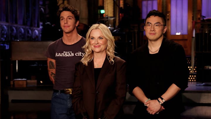 SATURDAY NIGHT LIVE -- Episode 1886 -- Pictured: (l-r) Musical guest Role Model, host Amy Poehler, and Bowen Yang -- (Photo by: Rosalind O'Connor/NBC)