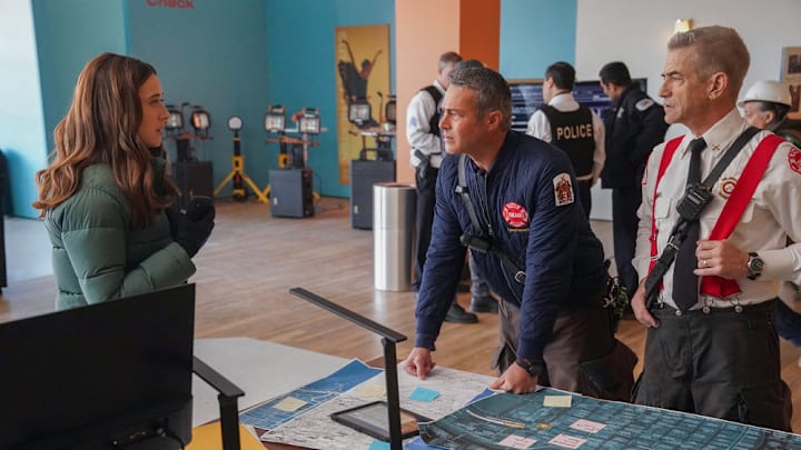 CHICAGO P.D. -- "In The Trenches: Part III" Episode 12014 -- Pictured: (l-r) Marina Squerciati as Officer Kim Burgess, Taylor Kinney as Kelly Severide, Dermot Mulroney as Chief Dom Pascal -- (Photo by: Elizabeth Sisson/NBC)