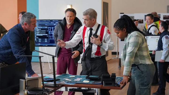 CHICAGO P.D. -- "In The Trenches: Part III" Episode 12014 -- Pictured: (l-r) Taylor Kinney as Kelly Severide, Steven Weber as Dr. Dean Archer, Dermot Mulroney as Chief Dom Pascal, Toya Turner as Kiana Cook -- (Photo by: Elizabeth Sisson/NBC)