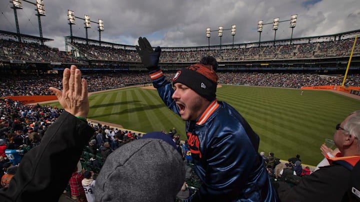 Sammy McLean, 29, of Windsor, Ontario, celebrates with friends after the Detroit Tigers score a run Sammy McLean, 29, of Windsor, Ontario, celebrates with friends after the Detroit Tigers score a run