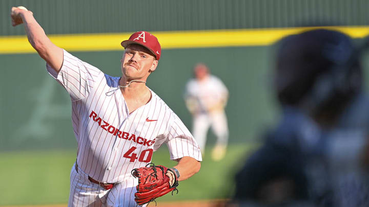 Arkansas Razorbacks pitcher Ben Bybee throws a pitch after relieving Brady Tygart on Saturday evening against Mississippi State in the second game of their series.