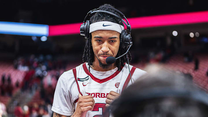 Arkansas Razorbacks point guard Boogie Fland with a postgame interview on TV after a win over Oakland on Dec. 30 at Bud Walton Arena in Fayetteville, Ark.