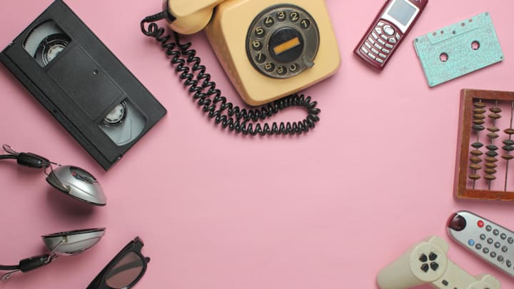 Various older technologies on a pink background