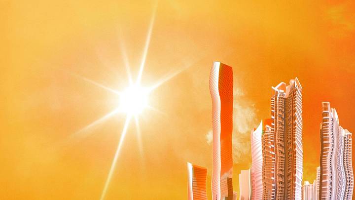 Blurry city buildings against orange background with bright sun Blurry city buildings against orange background with bright sun