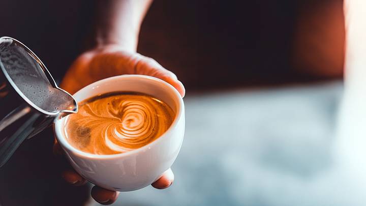 Barista making latte art