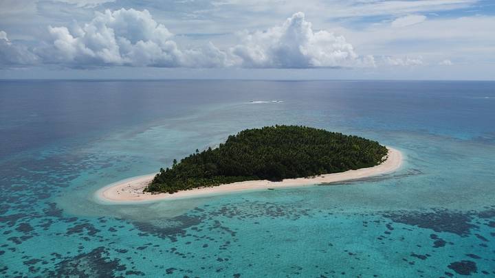 A coral islet in the Pacific, part of Tuvalu
