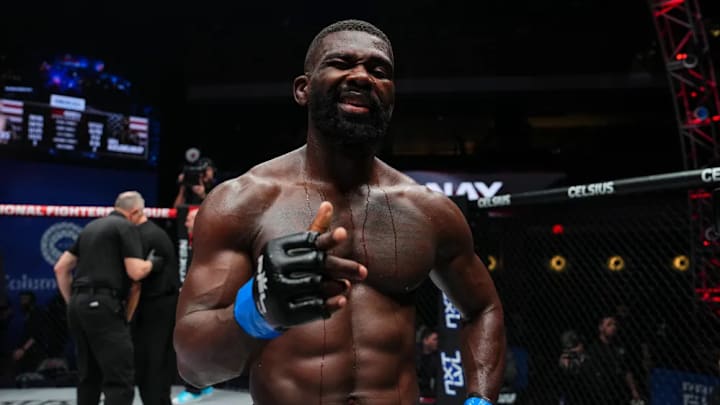 Impa Kasanganay celebrates a win inside the PFL SmartCage.