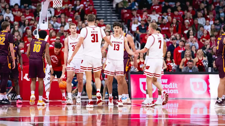 Hayden Jones (13) huddles with his teammates during Wisconsin's 88-61 win over Central Michigan. Hayden Jones (13) huddles with his teammates during Wisconsin's 88-61 win over Central Michigan.