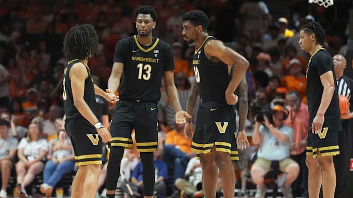Vanderbilt's Jalen Washington (13), Vanderbilt's Tyler Tanner (3) and Vanderbilt's AK Okereke (10) gather on the court during a men’s college basketball game between the Tennessee Vols and Vanderbilt Commodores, held at Thompson-Boling Arena at Food City Center in Knoxville, Tenn., March 7, 2026.