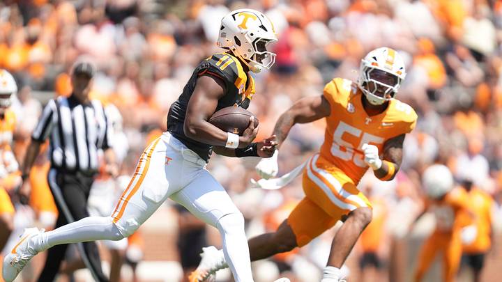 Tennessee quarterback Faizon Brandon (11) scrambles with the ball during the Orange and White game at Neyland Stadium in Knoxville, Tennessee, April 11, 2026. Tennessee quarterback Faizon Brandon (11) scrambles with the ball during the Orange and White game at Neyland Stadium in Knoxville, Tennessee, April 11, 2026.
