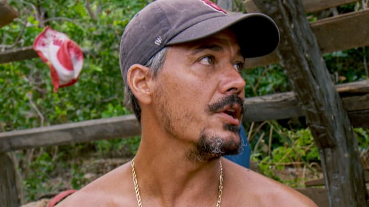 Boston Rob Mariano looking to the side