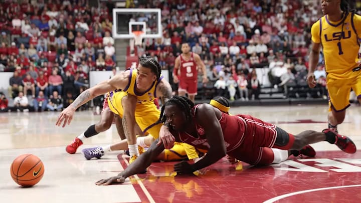 Alabama center Clifford Omoruyi (11) dives for a loose ball against LSU at Coleman Coliseum in Tuscaloosa, AL on Saturday, Jan 25, 2025.