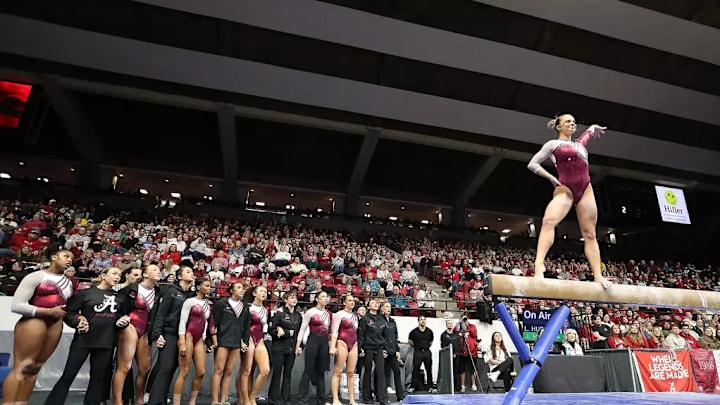 The University of Alabama Gymnastics Team cheers on Alabama Gymnast Lilly Hudson against Oklahoma University at Coleman Coliseum in Tuscaloosa, AL on Friday, Jan 24, 2025.