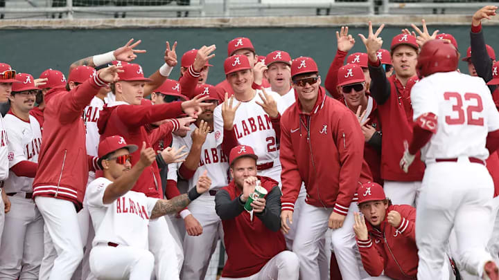 Alabama baseball players celebrate.