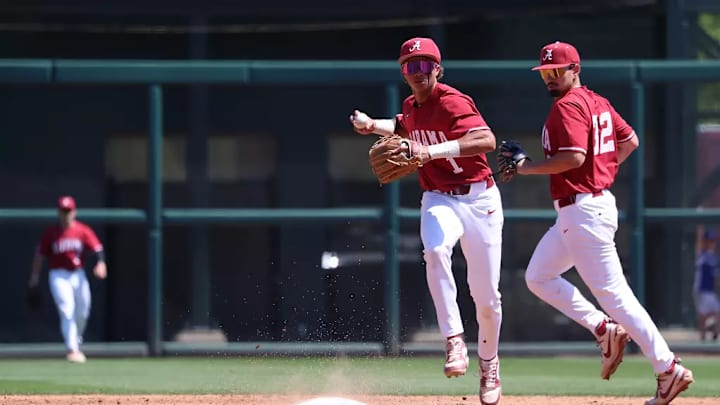 Alabama shortstop Justin Lebron (1) prepares for a throw against Mississippi State.