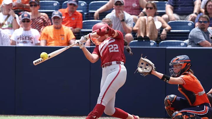 Alabama softball player Kali Heivilin (22) hits the ball against Auburn at Jane B. Moore Field in Auburn, AL on Saturday, May 4, 2024.