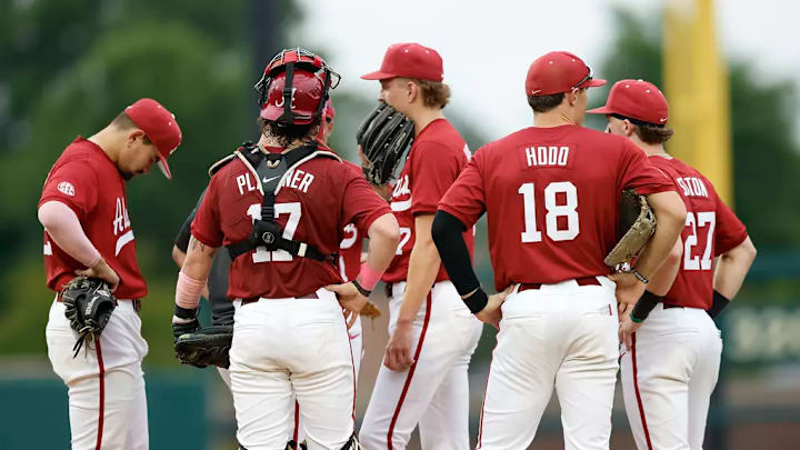 Alabama baseball players during a mound visit.