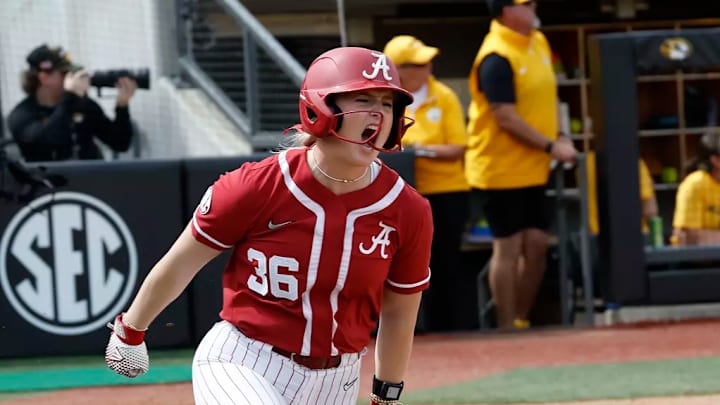 Alabama Softball Player Ambrey Taylor (36) celebrates a home run against Missouri