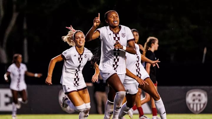 Mississippi State Forward Hannah Jibril (#11) and Mississippi State Midfielder Kara Harris (#4) during the match between the Jacksonville State Gamecocks and the Mississippi State Bulldogs at the MSU Soccer Field in Starkville, MS.