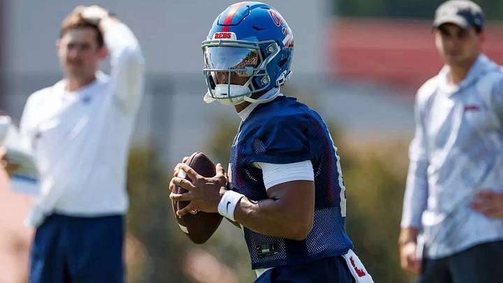 Ole Miss quarterback Trinidad Chambliss scans the field for a target during fall camp practice. Ole Miss quarterback Trinidad Chambliss scans the field for a target during fall camp practice.