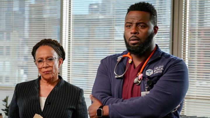 Guy Lockard and S. Epatha Merkerson looking upset from Chicago Med - Season 7