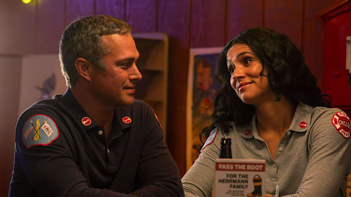 Taylor Kinney and Miranda Rae Mayo looking happy together