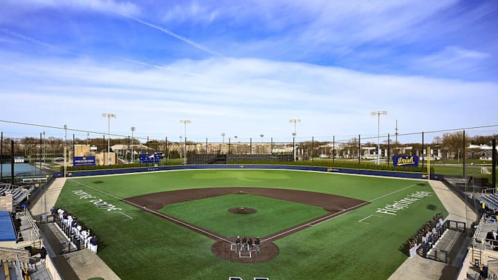 Notre Dame and Western Michigan stand for the national anthem Tuesday, March 19, 2024, at Frank Eck Stadium.