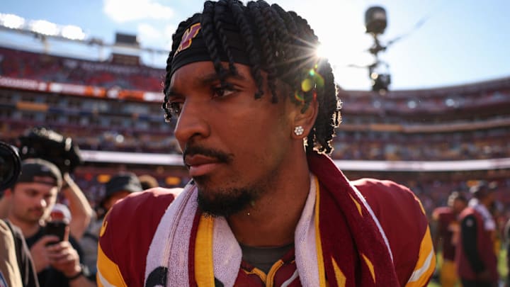 LANDOVER, MARYLAND - OCTOBER 06: Jayden Daniels #5 of the Washington Commanders looks on after the game against the Cleveland Browns at FedExField on October 06, 2024 in Landover, Maryland.