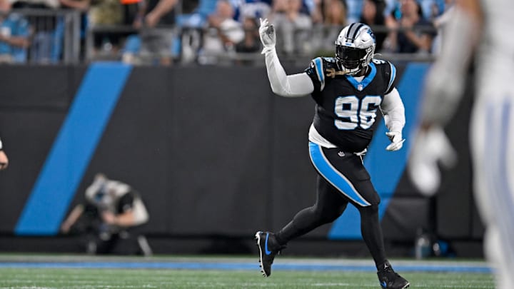 CHARLOTTE, NORTH CAROLINA - NOVEMBER 05: DeShawn Williams #96 of the Carolina Panthers celebrates after a sack during the third quarter of the game against the Indianapolis Colts at Bank of America Stadium on November 05, 2023 in Charlotte, North Carolina.