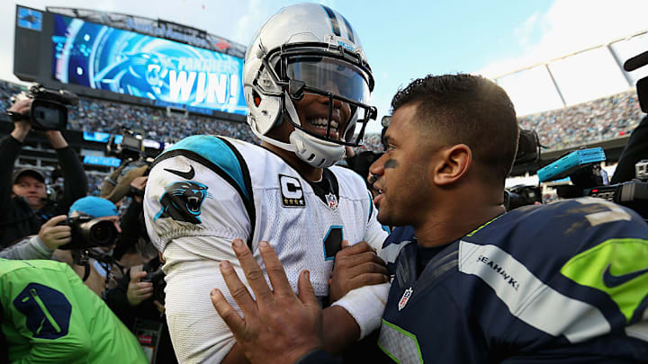 CHARLOTTE, NC - JANUARY 17: Cam Newton #1 of the Carolina Panthers shakes hands with Russell Wilson #3 of the Seattle Seahawks after the NFC Divisional Playoff Game at Bank of America Stadium on January 17, 2016 in Charlotte, North Carolina