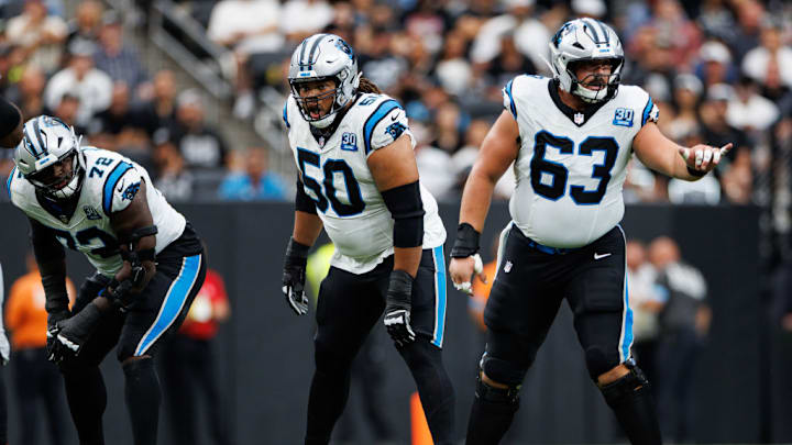 LAS VEGAS, NEVADA - SEPTEMBER 22: (L-R) Guard Robert Hunt #50 of the Carolina Panthers and center Austin Corbett #63 get set during the second quarter of an NFL football game against the Las Vegas Raiders, at Allegiant Stadium on September 22, 2024 in Las Vegas, Nevada.