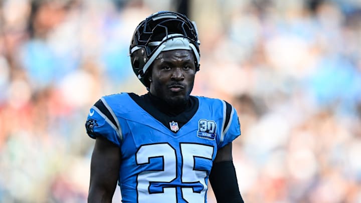 CHARLOTTE, NORTH CAROLINA - OCTOBER 13: Xavier Woods #25 of the Carolina Panthers looks on during the second quarter of their game against the Atlanta Falcons at Bank of America Stadium on October 13, 2024 in Charlotte, North Carolina.