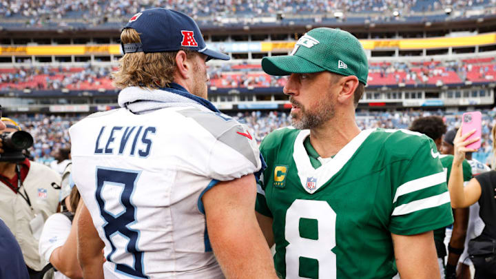 NASHVILLE, TENNESSEE - SEPTEMBER 15: Will Levis #8 of the Tennessee Titans and Aaron Rodgers #8 of the New York Jets meet after the game at Nissan Stadium on September 15, 2024 in Nashville, Tennessee.