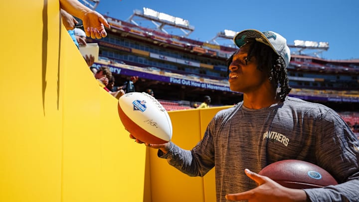 LANDOVER, MD - AUGUST 13: Jaycee Horn #8 of the Carolina Panthers interacts with fans before the preseason game against the Washington Commanders at FedExField on August 13, 2022 in Landover, Maryland. LANDOVER, MD - AUGUST 13: Jaycee Horn #8 of the Carolina Panthers interacts with fans before the preseason game against the Washington Commanders at FedExField on August 13, 2022 in Landover, Maryland.