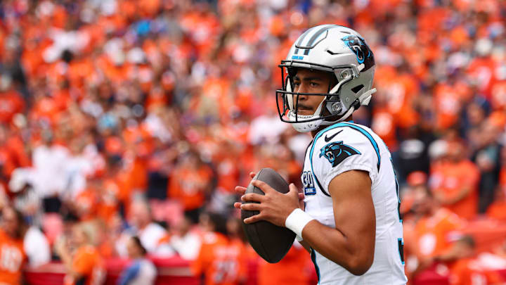 DENVER, COLORADO - OCTOBER 27: Bryce Young #9 of the Carolina Panthers warms up before the game against the Denver Broncos at Empower Field At Mile High on October 27, 2024 in Denver, Colorado. 