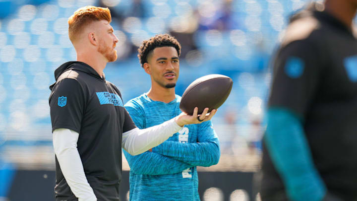 CHARLOTTE, NORTH CAROLINA - NOVEMBER 03: Bryce Young #9 and Andy Dalton #14 of the Carolina Panthers warms up prior to the game against the New Orleans Saints at Bank of America Stadium on November 03, 2024 in Charlotte, North Carolina. CHARLOTTE, NORTH CAROLINA - NOVEMBER 03: Bryce Young #9 and Andy Dalton #14 of the Carolina Panthers warms up prior to the game against the New Orleans Saints at Bank of America Stadium on November 03, 2024 in Charlotte, North Carolina.