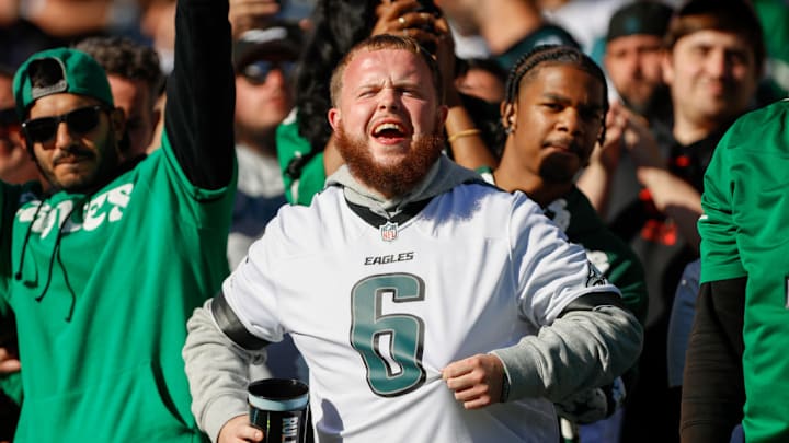 CINCINNATI, OH - OCTOBER 27: A Philadelphia Eagles fan cheers during the game against the Philadelphia Eagles and the Cincinnati Bengals on October 27, 2024, at Paycor Stadium in Cincinnati, OH. CINCINNATI, OH - OCTOBER 27: A Philadelphia Eagles fan cheers during the game against the Philadelphia Eagles and the Cincinnati Bengals on October 27, 2024, at Paycor Stadium in Cincinnati, OH.