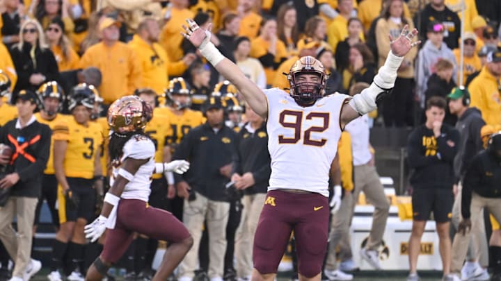 IOWA CITY, IA - OCTOBER 21: Minnesota defensive lineman Danny Striggow (92) reacts to an Iowa pass interception in the final minute during a college football game between the Minnesota Golden Gophers and the Iowa Hawkeyes on October 21, 2023, at Kinnick Stadium in Iowa City, IA. IOWA CITY, IA - OCTOBER 21: Minnesota defensive lineman Danny Striggow (92) reacts to an Iowa pass interception in the final minute during a college football game between the Minnesota Golden Gophers and the Iowa Hawkeyes on October 21, 2023, at Kinnick Stadium in Iowa City, IA.