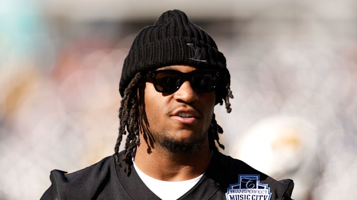 NASHVILLE, TENNESSEE - DECEMBER 30: Luther Burden III #3 of the Missouri Tigers looks on prior to the Transperfect Music City Bowl against the Iowa Hawkeyes at Nissan Stadium on December 30, 2024 in Nashville, Tennessee. 