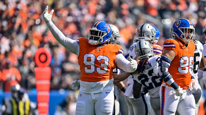 DENVER, CO - OCTOBER 6: Denver Broncos defensive tackle D.J. Jones (93) celebrates after a tackle for a loss in the first quarter during a game between the Las Vegas Raiders and the Denver Broncos at Empower Field at Mile High on October 6, 2024 in Denver, Colorado. DENVER, CO - OCTOBER 6: Denver Broncos defensive tackle D.J. Jones (93) celebrates after a tackle for a loss in the first quarter during a game between the Las Vegas Raiders and the Denver Broncos at Empower Field at Mile High on October 6, 2024 in Denver, Colorado.