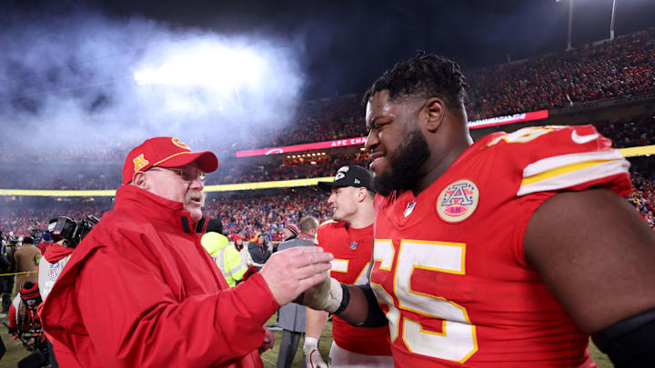 KANSAS CITY, MISSOURI - JANUARY 26: Head coach Andy Reid of the Kansas City Chiefs shakes hands with Trey Smith #65 after defeating the Buffalo Bills 32-29 in the AFC Championship Game at GEHA Field at Arrowhead Stadium on January 26, 2025 in Kansas City, Missouri. KANSAS CITY, MISSOURI - JANUARY 26: Head coach Andy Reid of the Kansas City Chiefs shakes hands with Trey Smith #65 after defeating the Buffalo Bills 32-29 in the AFC Championship Game at GEHA Field at Arrowhead Stadium on January 26, 2025 in Kansas City, Missouri.