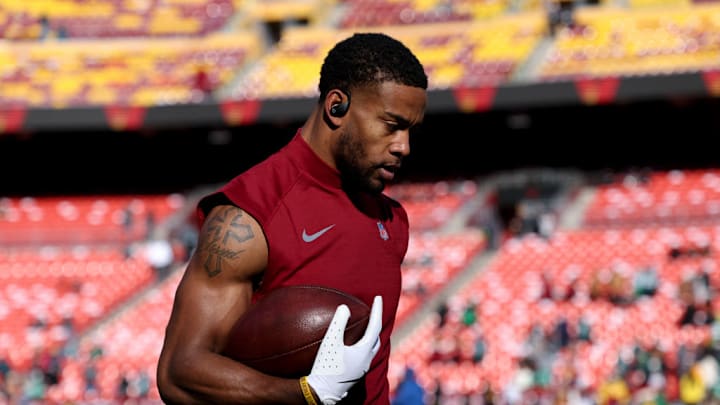 LANDOVER, MARYLAND - DECEMBER 22: Jeremy Chinn #11 of the Washington Commanders warms up prior to a game against the Philadelphia Eagles at Northwest Stadium on December 22, 2024 in Landover, Maryland. The Commanders defeated the Eagles 36-33.
